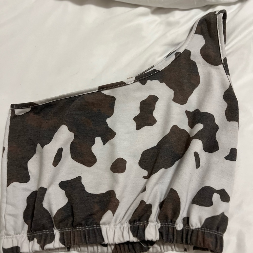 One shoulder cow print top